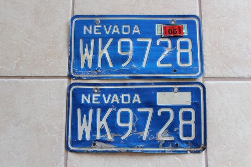 A PAIR OF NEVADA BLUE LICENSE PLATES GOOD CONDITION # WK 9728 NO RES.