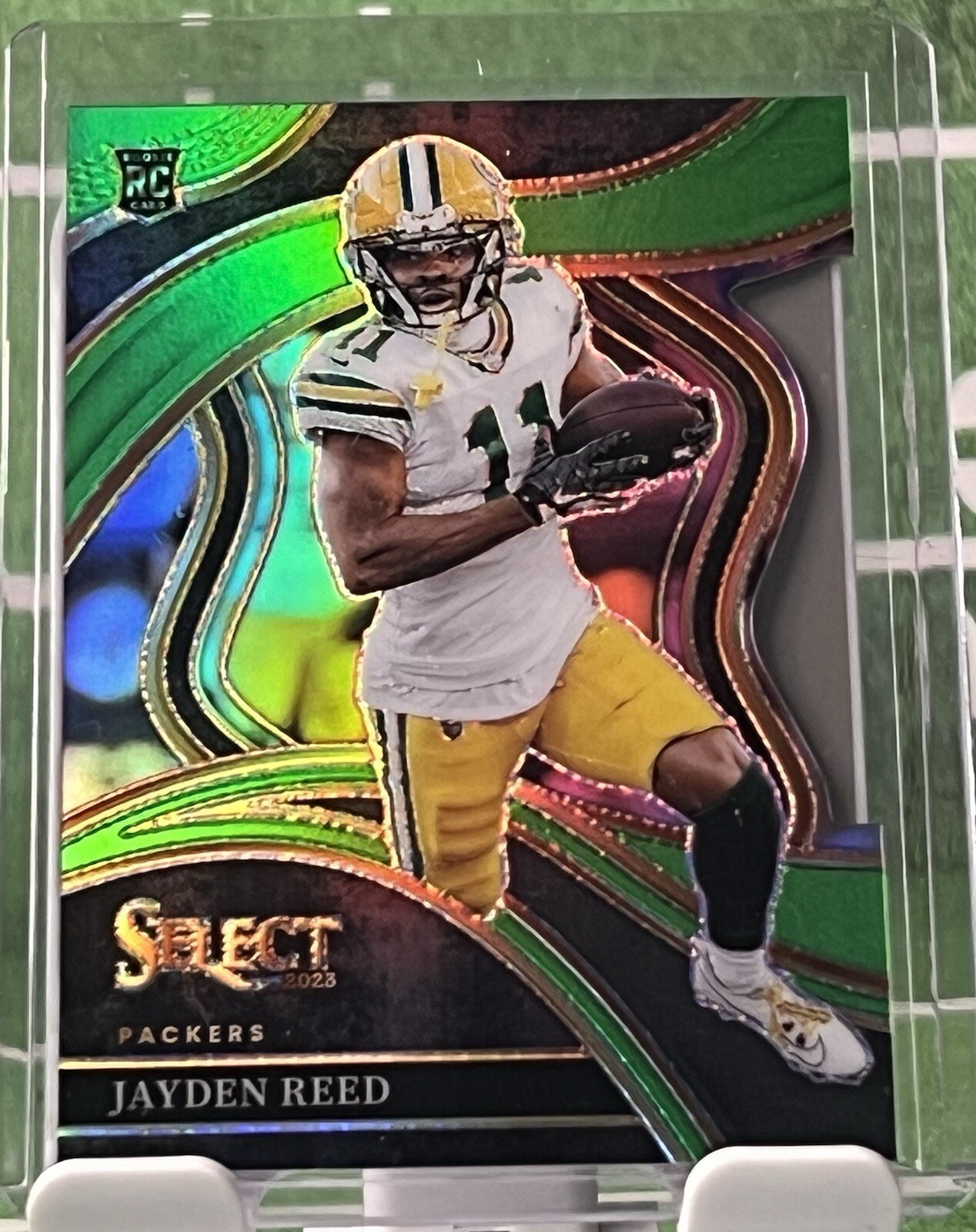 2023 Panini Select - Club Level Neon Green Prizm Die-Cut Jayden Reed /499 (RC)