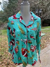 Camisa con botones de franela estampado de Papá Noel verde azulado Wonder Shop talla M