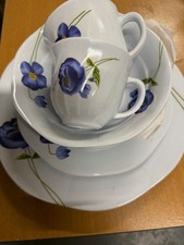 Juego de 7 platos, cuencos y tazas de té de melamina blancas con aciano azul