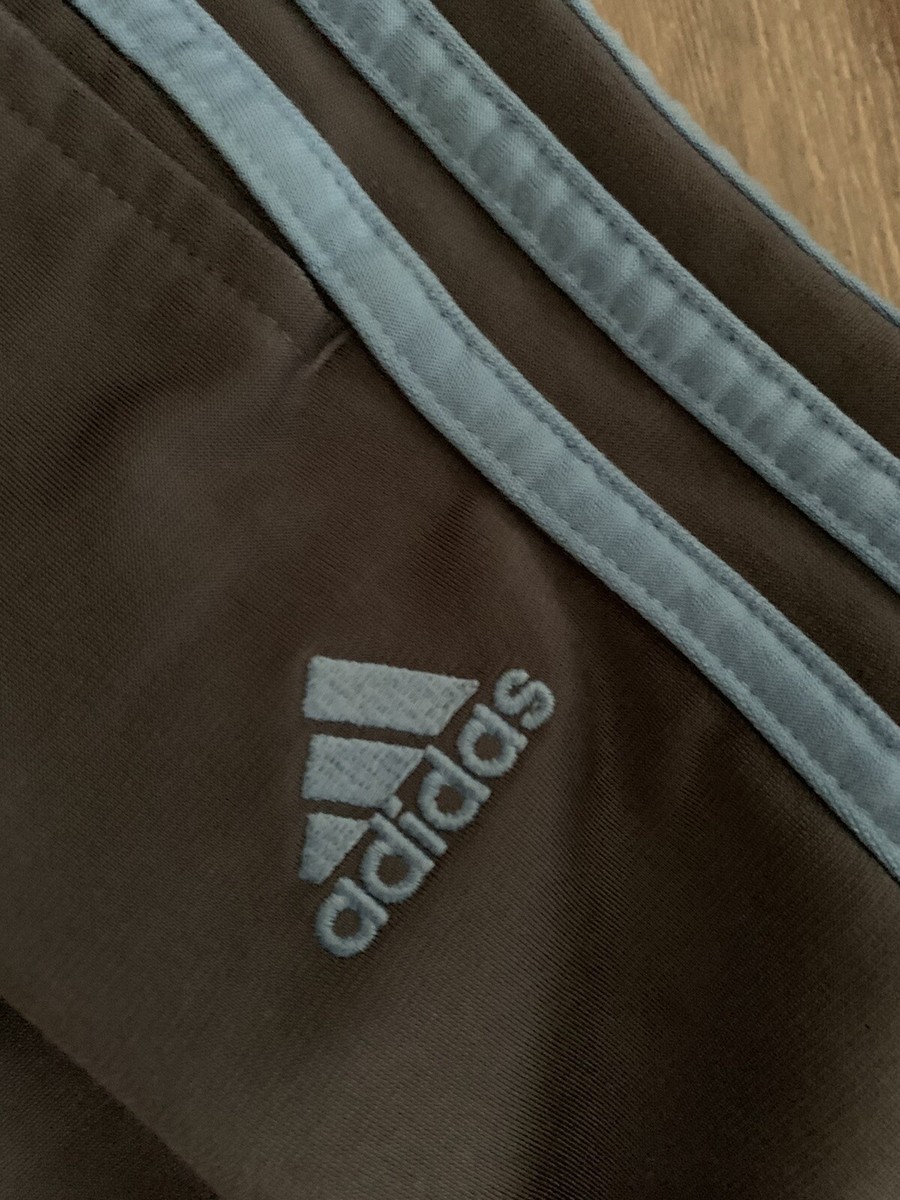 grey adidas joggers with blue stripes