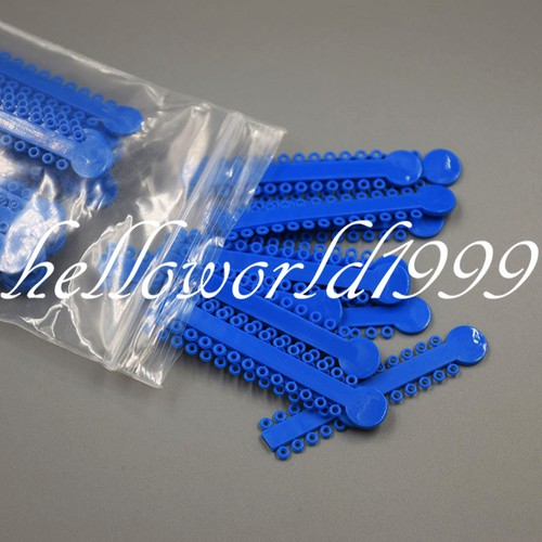 45 sacs attaches ligature orthodontique dentaire bandes élastiques en caoutchouc 45 couleurs 1040 pièces - Photo 2/12