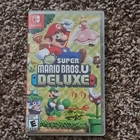 New ListingNew Super Mario Bros. U Deluxe Switch