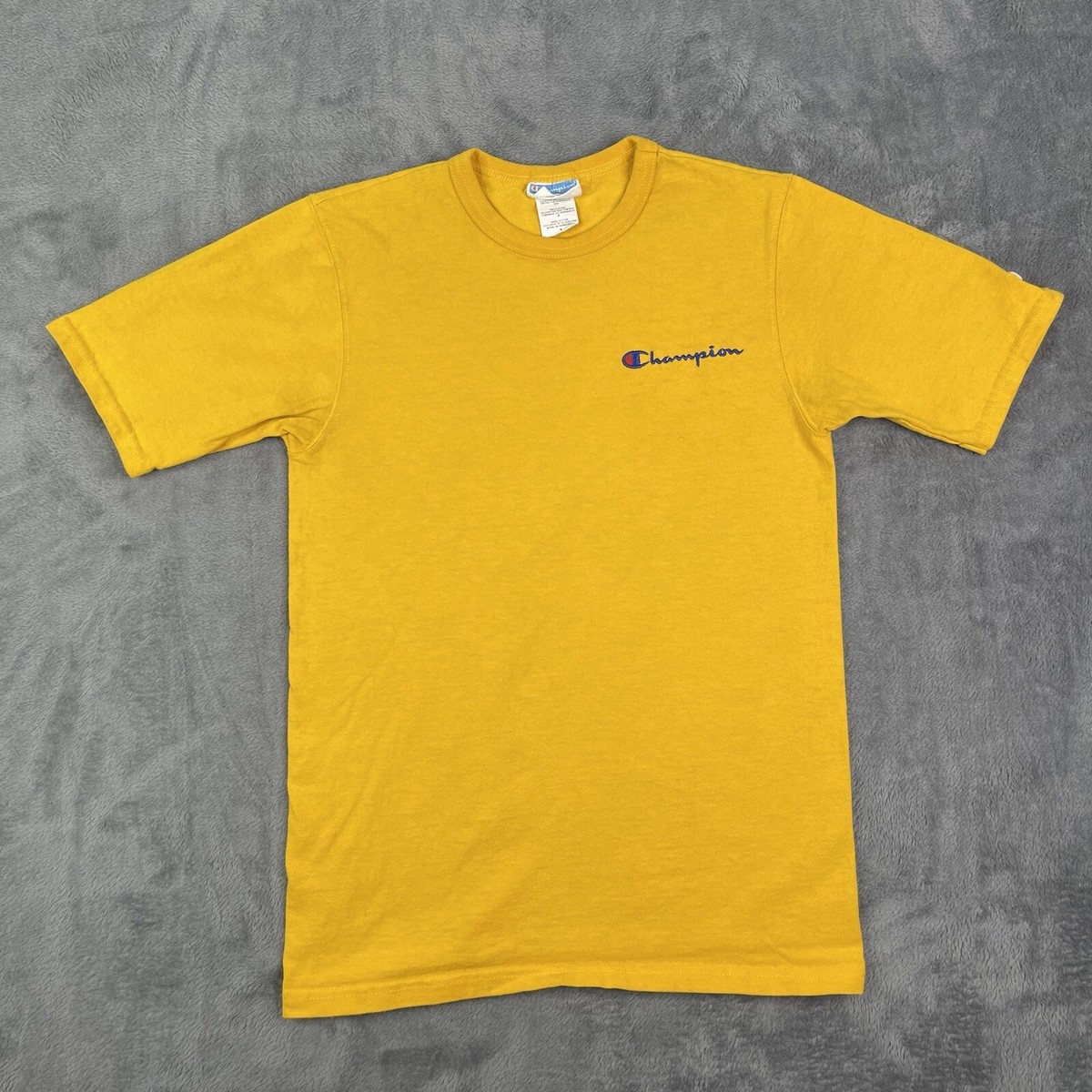 yellow champion shirt