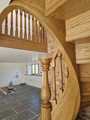 Exclusive carved oak stairs curved with oak spindles E-Brochure - Picture 3 of 10