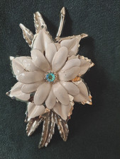 Vintage brooch. Flower design. Cream enamel with blue stone. Good condition