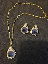 Gold Tone Purple Stone with Clear Accent Pend...