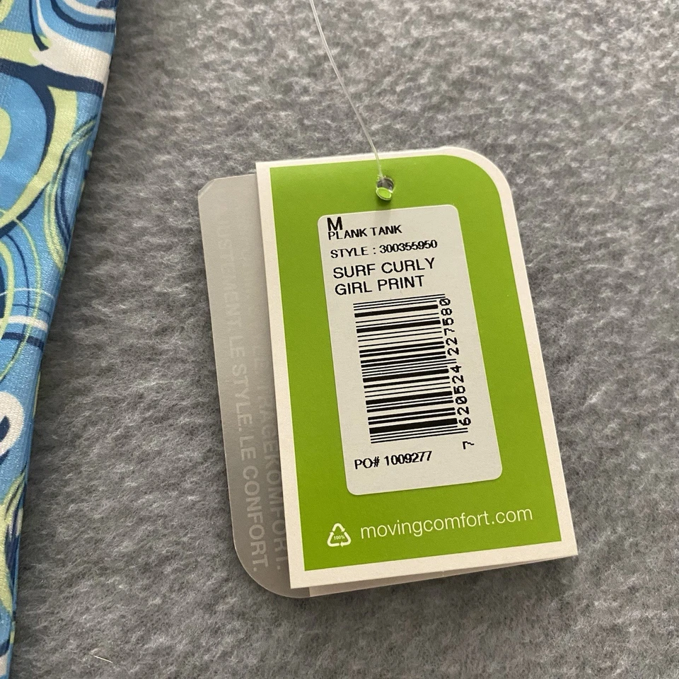 Camiseta sin mangas Moving Comfort para mujer azul medio geométrica protección UV cuello activo en V Foto 4 de 4