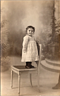 RPPC Sweet Baby Girl Fancy White Lace Dress Standing on Chair Studio P.UN. N-294