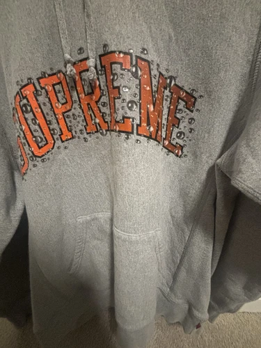 Sweat à capuche homme SUPREME gris bruyère taille M orange lettres arc