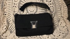 A Black Wool Handbag Circa 1940s With Clear Ornate Bakelite Snap Closure And Two