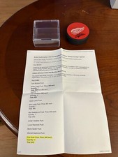 Pius Suter #24 Autographed Detroit Red Wings Hockey Puck