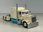 1/64 DCP OFF WHITE & BABY BLUE PETERBILT 389 63" BUNK 285" FRAME (6" long)