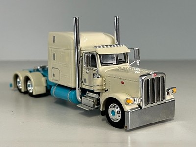 1/64 DCP OFF WHITE & BABY BLUE PETERBILT 389 63'' BUNK 285'' FRAME (6'' long)