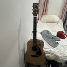 Yamaha F310 Acoustic Guitar 6-String - Used -DOES NOT INCLUDE CROSS CHARM & CAPO