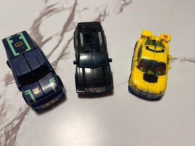 Transformers Lot of 3 Transforming Car Robot Action Figures Multicolor Plastic
