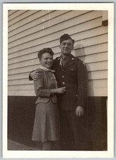Vtg B W Snapshot WWII Soldier in Uniform And Woman in Plaid Suit 1940s