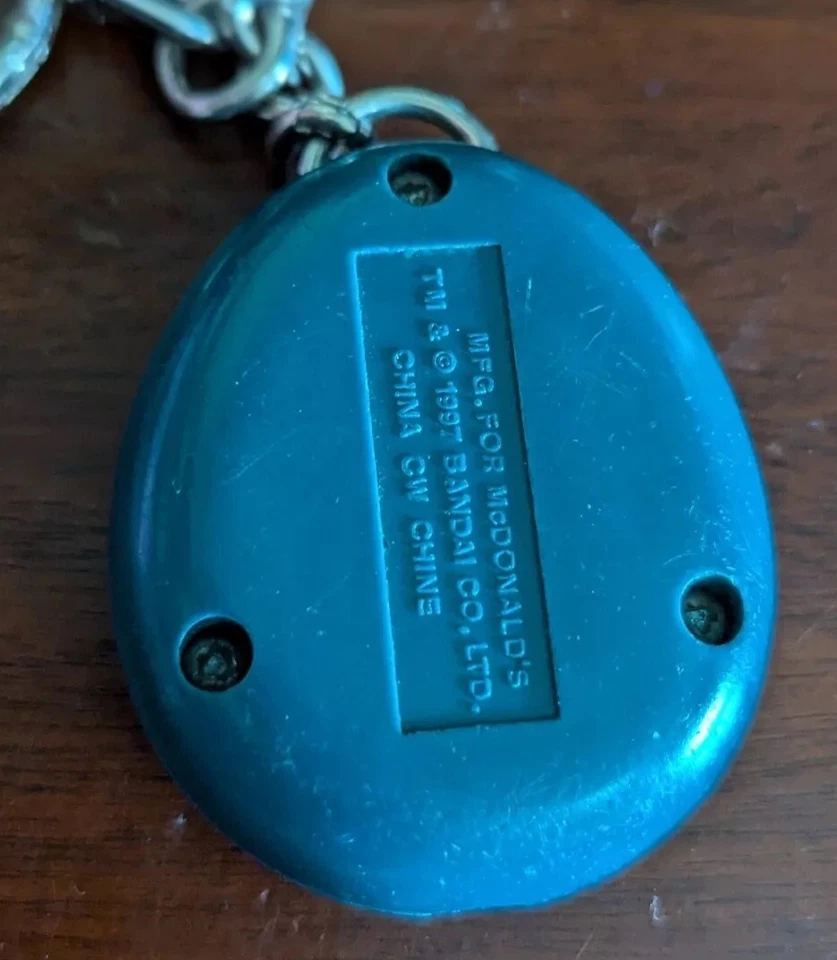 Llavero Vintage Tamagotchi Azul 1997 McDonalds Juguete Llavero Años 90 Bandai Foto 2 de 3