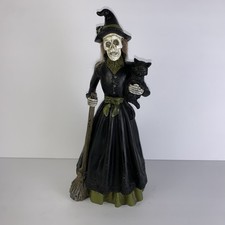 Skeletal witch with light up eyes figurine halloween home decor 12"