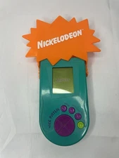 Nickelodeon Nick Puzzler Teal/blue Handheld Travel Game Electronic LCD Works