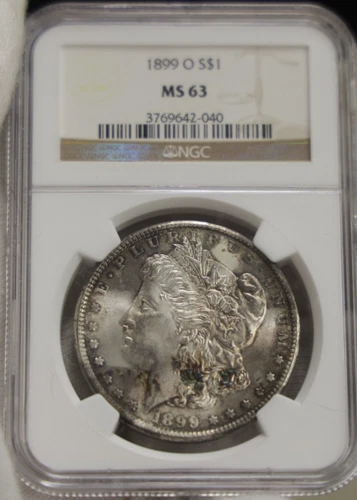 1899 O US Morgan Silver Dollar $1 NGC MS63 Crisscross Toning