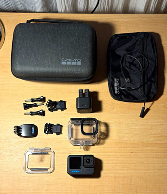 GoPro HERO11 Black Bundle w/ Case, Dual Charger, Batteries, Mounts, Housings