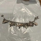 Sterling Silver Bracelet With 21 Charms / 8” Long / 1.2 Oz / Needs Spring Ring