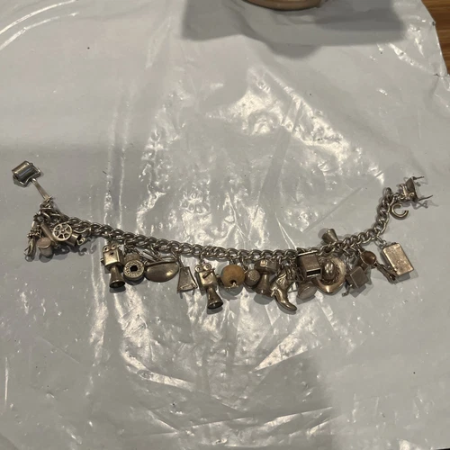 Sterling Silver Bracelet With 21 Charms / 8” Long / 1.2 Oz / Needs Spring Ring