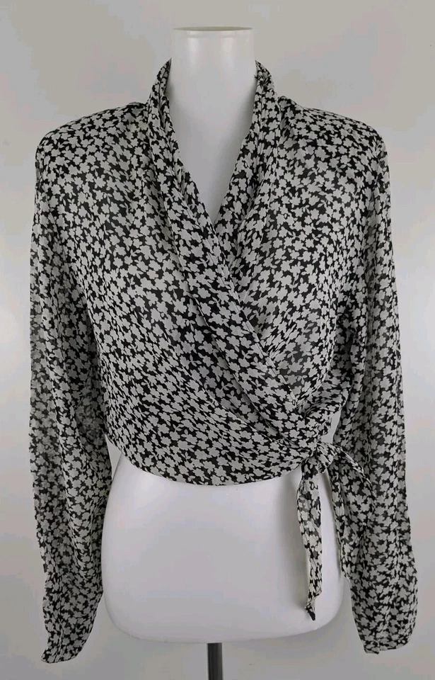 Blusa envolvente Zanella crepé transparente negra blanca floral elegante carrera 8 hecha en Italia Foto 3 de 4