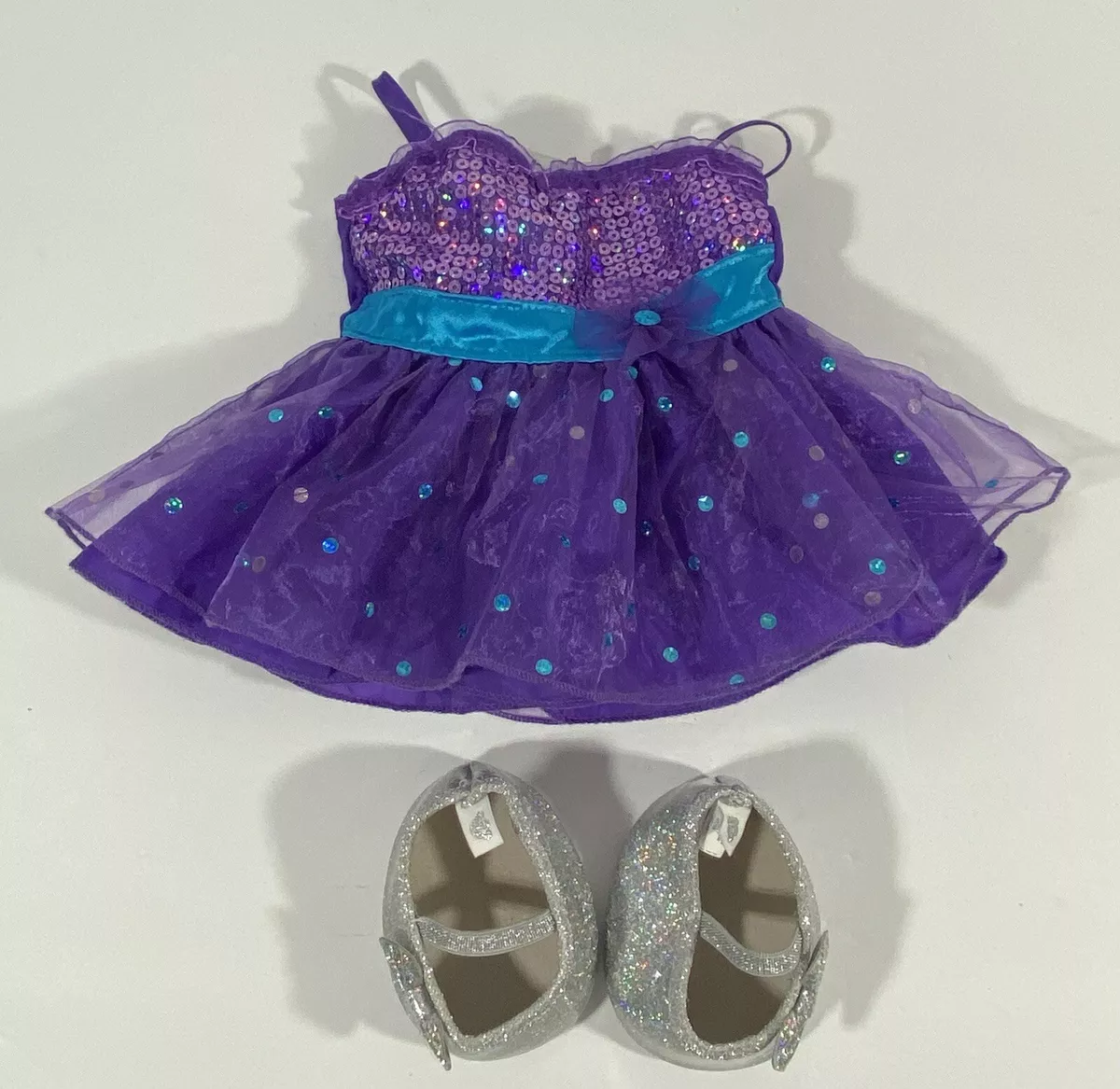 Purple dress and silver shoes 2025