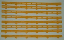 AURORA AFX GUARD RAILS - 8 PC  FOR SLITTED TRACKS  DARK YELLOW - GOOD-VG COND