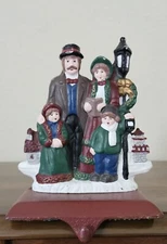 VTG Stocking Mantel Holder Metal Christmas Caroling Family Hanger Dickens. 