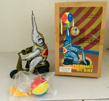 Elephant On Bike W/ Ball Wind Up Toy