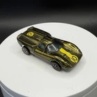 Vintage Hot Wheels Redline Lola GT70 Olive US Base - Very Good, One Loose Hinge