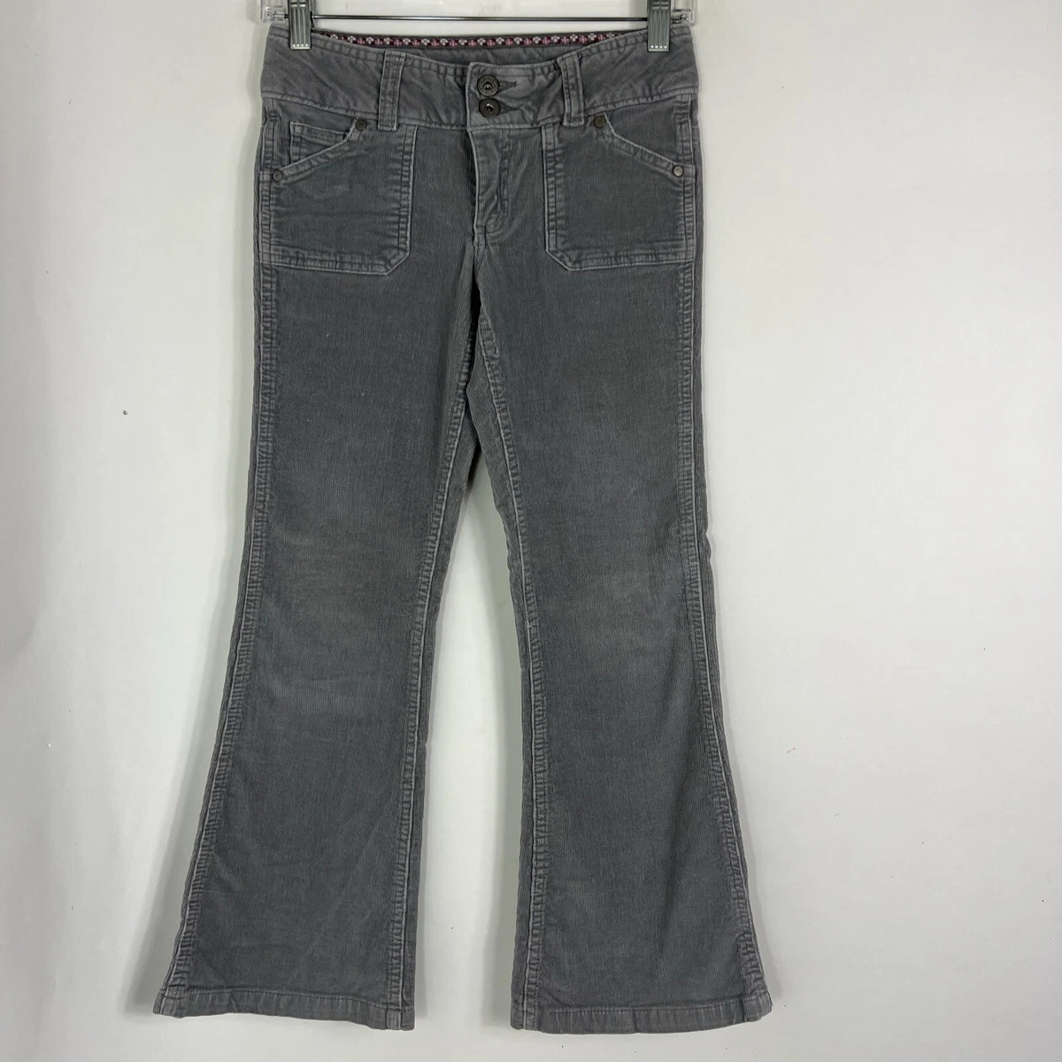 Dark brown Empyre corduroys. Light wash faded. A