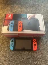 Nintendo Switch 32GB Handheld Console Neon Blue/Red with Dock and Joy Con Grip
