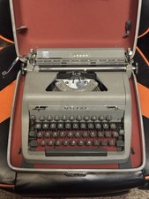 ROYAL ARROW 1950's TYPEWRITER WITH ORIGINAL CASE, MANUAL WARRANTY AND RECEIPT thumbnail