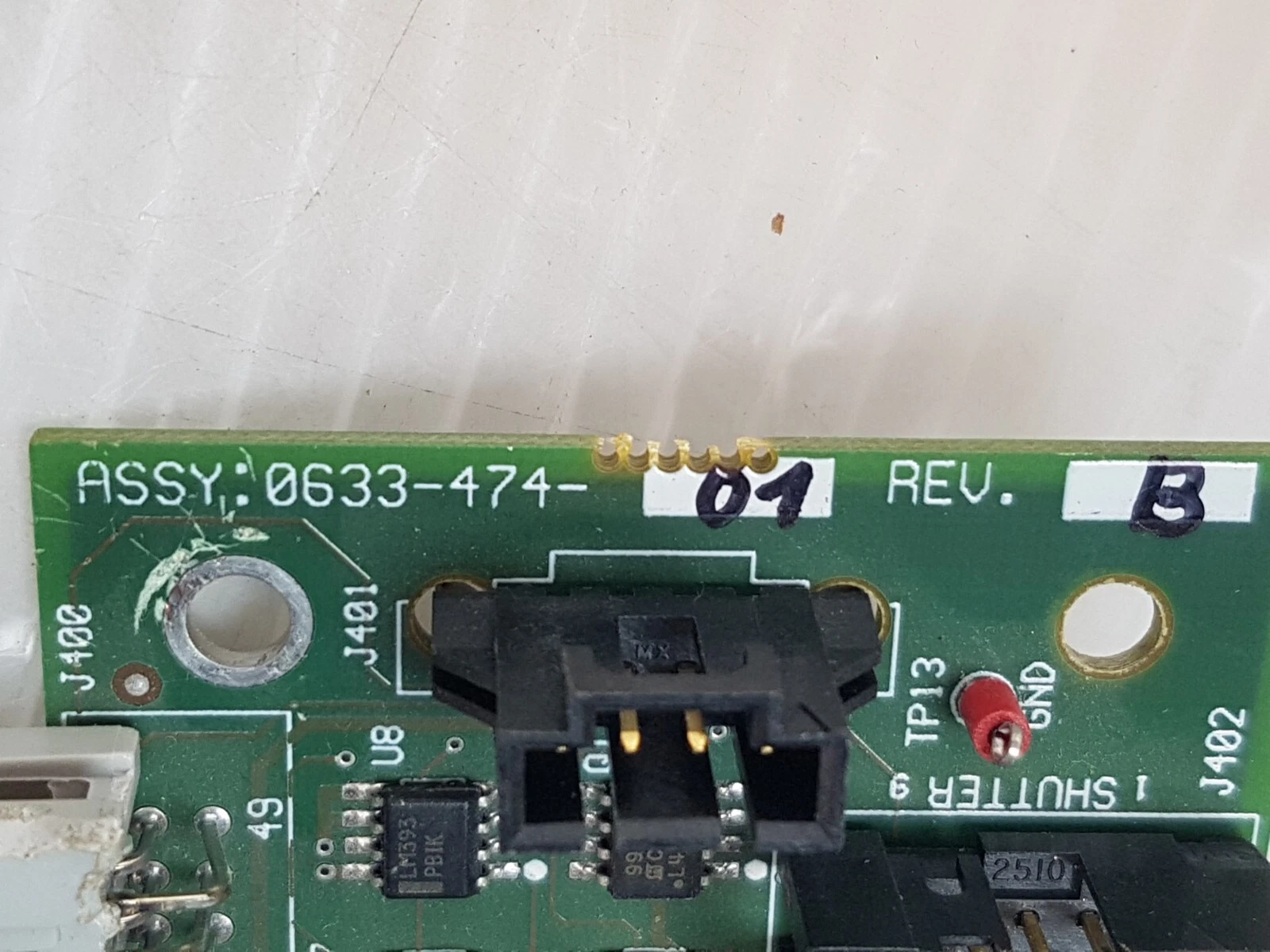 Close-up of ASSY 0633-474-01 REV. B hand-marked silkscreen and SHUTTER connector