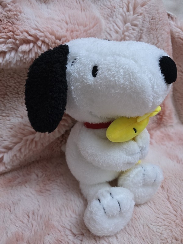 Snoopy stuffed toy with wood stock approx. 12"