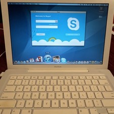 Working Apple Macbook Computer-A1181 pre2010 White, 2GB RAM-bundle W/ charger.