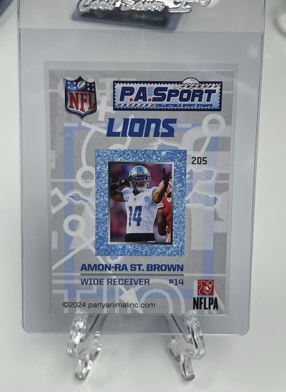 AMON-RA ST. BROWN - P.A. SPORT NFL (2025) SERIES SPORT STAMPS (RARE 1:12 PACKS)