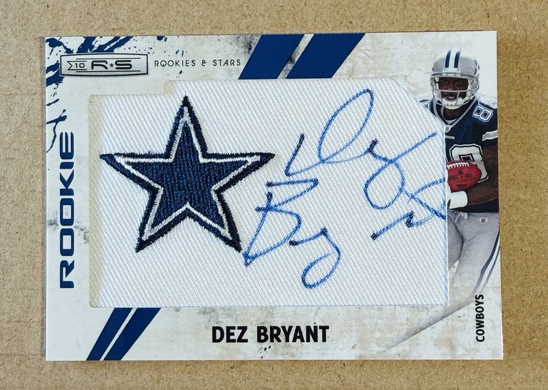 Dez Bryant 2010 Panini Rookies & Stars R&S Dallas Cowboys Logo Patch Auto RC /25
