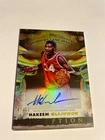 24/25 Inception Hakeem Olajuwon Rockets-MEMORY LANE MARKS GOLD AUTO /50