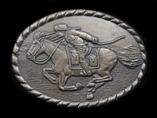 RL05119 VINTAGE 1981  PONY EXPRESS RIDER MERVYN'S ADVERTISEMENT  BELT BUCKLE