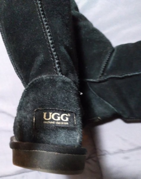 Pair of Black Sheepskin Ugg Boots. Size 8