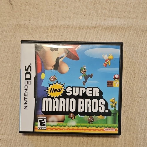 Nintendo New Super Mario Bros. Nintendo DS with Case, Cartridge & Manual