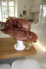 smart ladies warm brown organza type wedding hat( foldable holiday abroad?)
