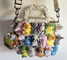 Cream Canvas Shoulder Bag Covered In Rows Of 20 Tiny, Colorful Animal Plushies.