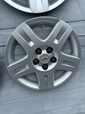 Set Of 4 Silver Bolt-On Hubcaps Wheel Covers For 2006-2011 Chevrolet HHR - Replacement Part #45916S