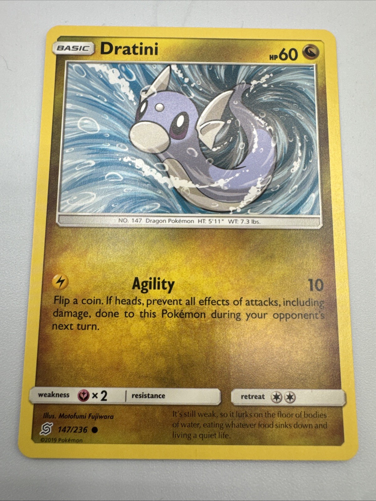 Dratini (147) 147/236 Common SM - Unified Minds LP Pokemon Card